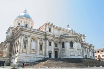 Exterior view from the west, which is the end with the apse in ancient Roman churches. The present appearance dates from the 18th century.
