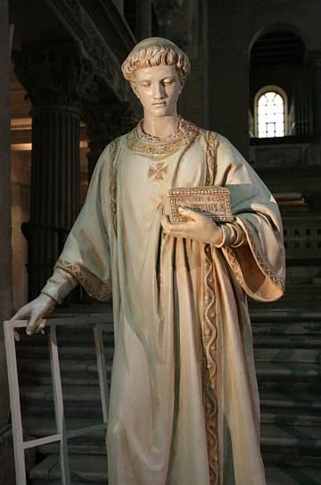 Statue of St. Lawrence holding his gridiron in the Basilica di San Lorenzo fuori le Mura (Saint Lawrence outside the Walls), Rome, Italy.