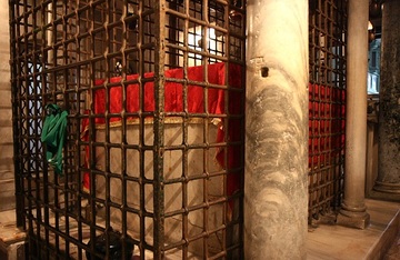 The tomb of St. Lawrence, a Roman deacon martyred in 258 AD. His resting place has not been moved since his burial: the catacombs around it were cut away to provide access and the church was built over it. The present design of the tomb area dates from the 13th century. Basilica di San Lorenzo fuori le Mura (Saint Lawrence outside the Walls), Rome, Italy.