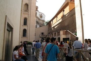 View of the Sistine Chapel from next to St. Peter's Basilica. The line is for the dome and tower of the basilica, not for the chapel which you enter via the Vatican Museums (and often a longer line).