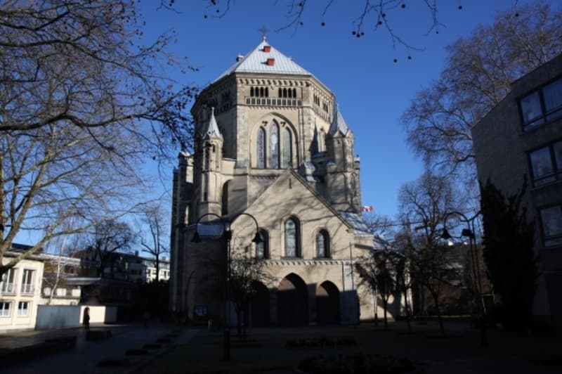 Exterior view from the west, showing the porch and great dome.